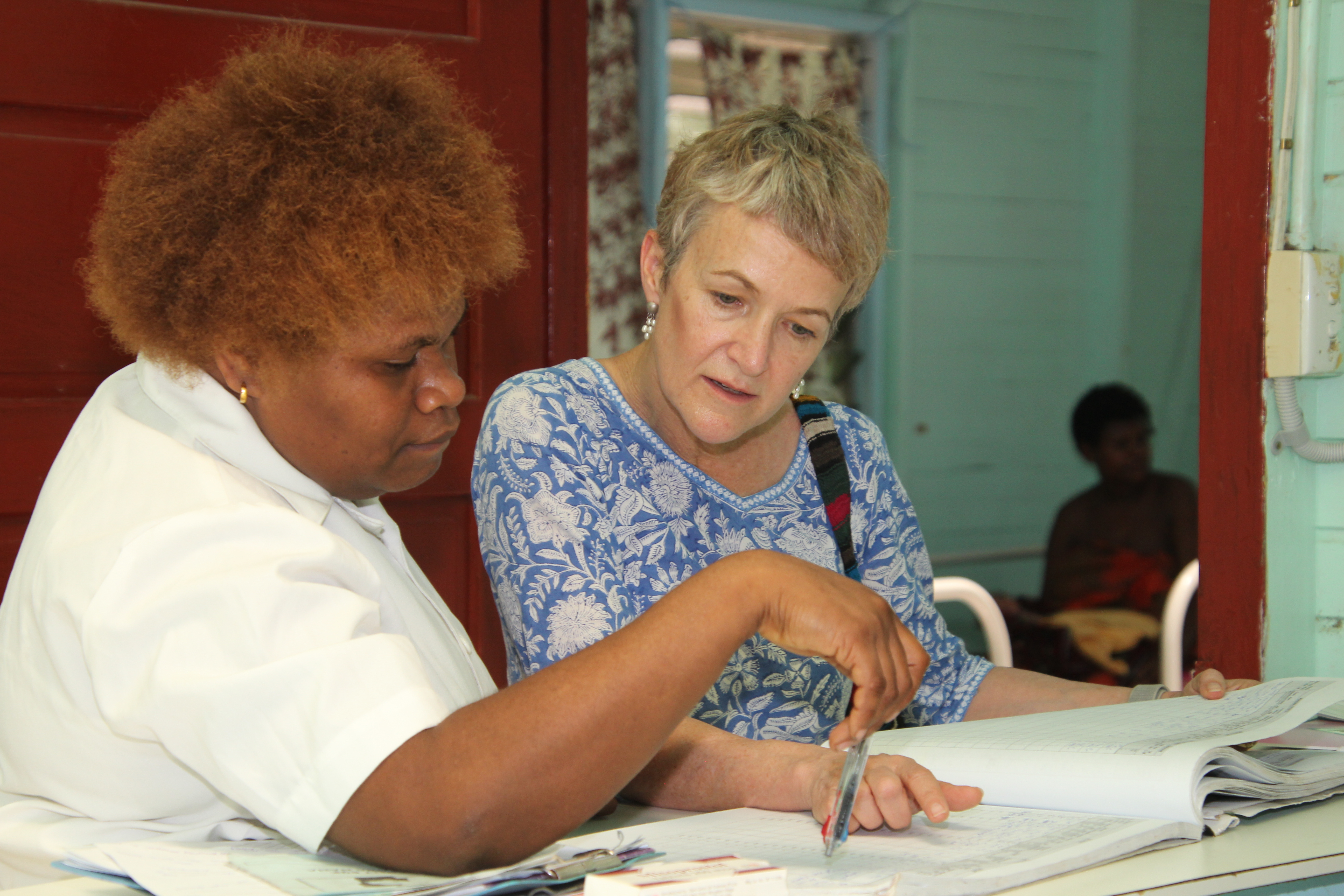 Professor Caroline Homer AO (right) with Sister Jennifer Bata 