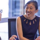 Two researchers chatting