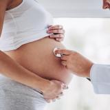 Pregnant lady with doctor