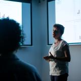 Decorative image - Woman giving presentation
