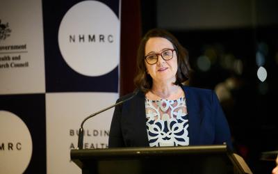 woman behind a lectern
