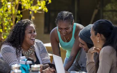 Indigenous women talking and laughing