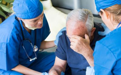 Stroke victim being treated by doctors