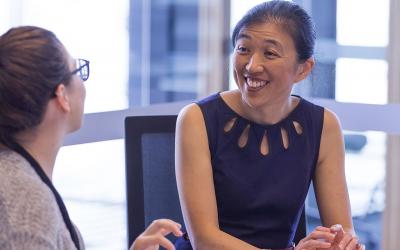 Two researchers chatting