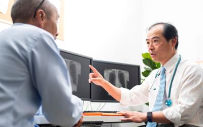 Decorative image - Doctor talking to patient
