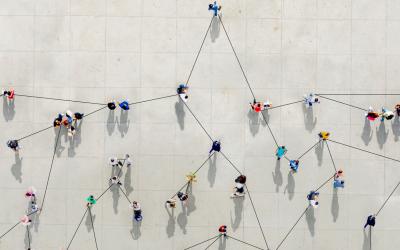 Birdseye view of crowd forming a growth graph