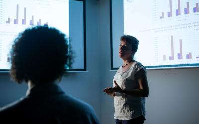 Decorative image - Woman giving presentation
