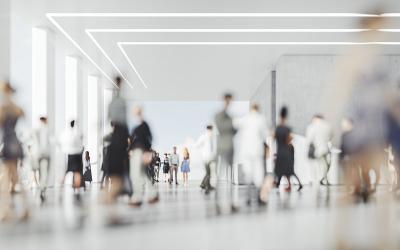 people moving around a building