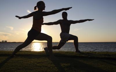 two people in a yoga pose